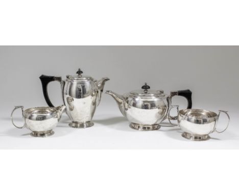 An Edward VIII silver four piece tea service of circular bulbous form, comprising - tea pot with ebonised finial and handle 5