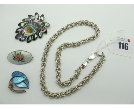 A Norwegian Enamel Double Leaf Brooch, highlighted in blue, stamped "925S Sterling Made In Norway"; a Norwegian oval panel br