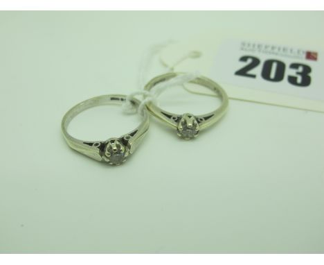 A 9ct White Gold Single Stone Ring, claw set, between tapered shoulders (finger size L), another similar, stamped "375" (fing