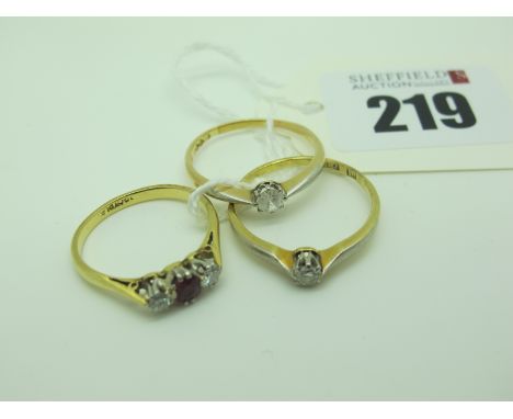 Two Single Stone Diamond Rings, claw set; together with a three stone ring. (3) 