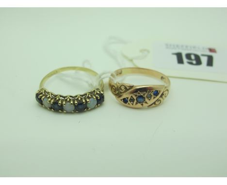 A Victorian Style Dress Ring alternate inset highlights, within decorative setting and shoulders, stamped "9 375" (finger siz