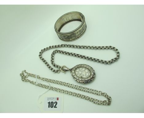 An Oval Locket Pendant, foliate engraved to the front, on a shaped belcher link chain; a Victorian hallmarked silver wide hin