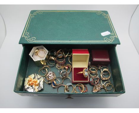 A Mixed Lot of Assorted Costume Dress Rings, contained in a a set of trinket drawers. 