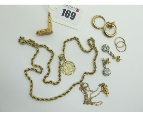 A 9ct Gold 'Boston Stump by S.T. Hopper Ltd' Charm Pendant, (3.5grams) together with a Maltese Cross pendant, a gilt metal ro