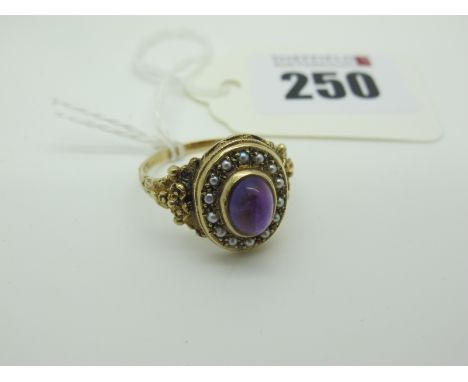 A 9ct Gold Amethyst and Pearl Set Ring, oval collet et to the centre, between textured tapering shoulders ((finger size V). 