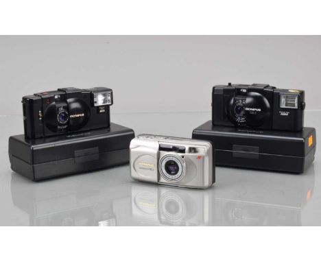 Three Olympus Compact Cameras, an Olympus XA-1, shutter working, light cell responsive, with untested A9M flash unit, XA-2, s