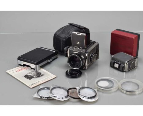 A Zenza Bronica S Camera, grey &amp; chrome, serial no CG 45092, shutter working, body G, some light grime, light paint wear 