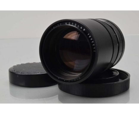 A Leitz Wetzlar Elmarit-R 135mm f/2.8 Lens, serial no 1995534, 1963, single CAM, barrel G-VG, small paint scratch to hood, el