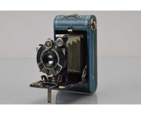 A Kodak Vest Pocket Series III Folding Camera, blue, shutter working, body F-G, some scuffs, scratches, paint wear bed edges,