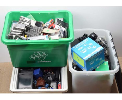 Three Boxes of Camera Related Accessories, including flash units, eye cups, light meters, hoods, filters, hoods, brackets and