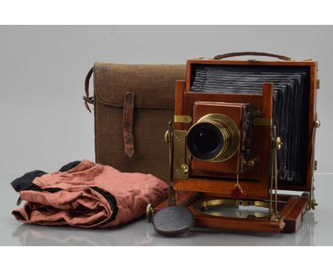 A Mahogany & Brass Half Plate Camera, double extension, body G, some light tarnishing to brass, small twist to fixing front s