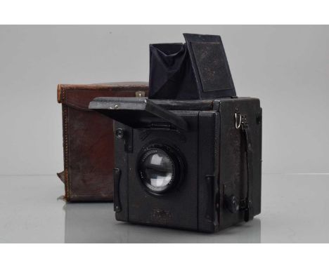 A Dallmeyer Special Press 3¼ x 4¼ Reflex Camera, shutter not working, body F, bellows G, viewing hood G, with Dallmeyer Press