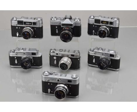 A Tray of Soviet Cameras, two Korki 4K, one shutter not working, with Jupiter 50mm f/2 lenses, Zorki 6, shutter fires, with 5