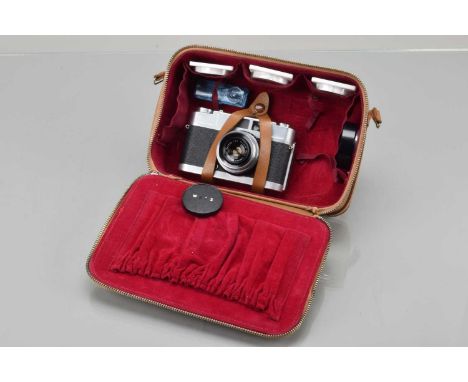 A Walz Wide 35mm Camera, serial no 20041, shutter working, body G, with Walzer 3.5cm f/2.8 lens, elements G-VG, Walz UV, Y2 &