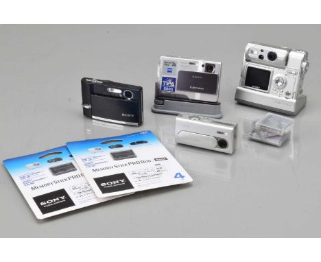 Four Sony CyberShot Digital Cameras, a CyberShot DSC-T7, silver, shutter working, display working, flash working, self timer 