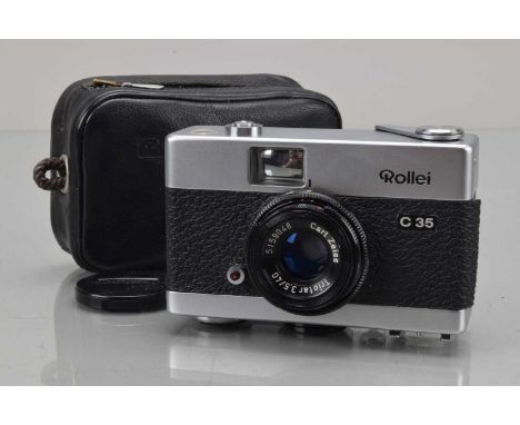 A Rollei C 35 Compact Camera, chrome, made in Germany, shutter working, body G, tiny ding to top front, with Carl Zeiss 40mm 