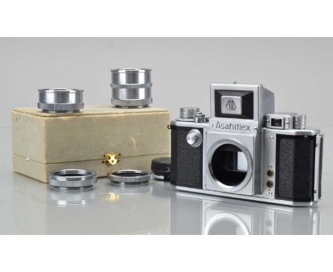 An Asahiflex IIA Camera Body, serial no 77183,  shutter working, not working in slow speeds, body G-VG, with Asahi extension 