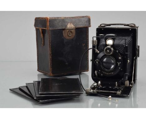 A Voigtländer Avus 9 x 12cm Folding Plate Camera, shutter working, body G, some scuffs to leatherette, some paint wear to edg