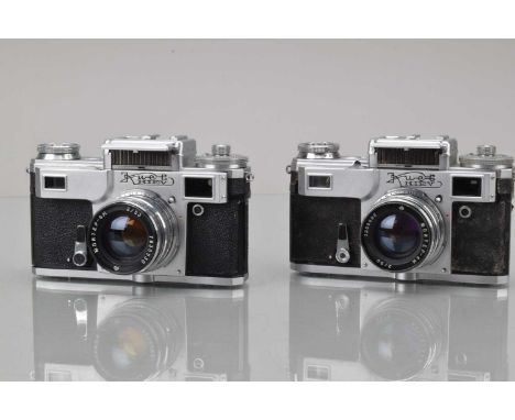 Two Kiev-4 Rangefinder Cameras, one shutter working, light cell responsive,  self timer working, rangefinder not working, wit