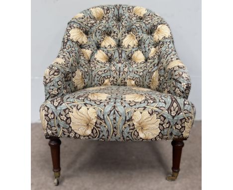 A late Victorian library tub chair in later William Morris style upholstery, 87 x 64 x 76 cm.&nbsp;
