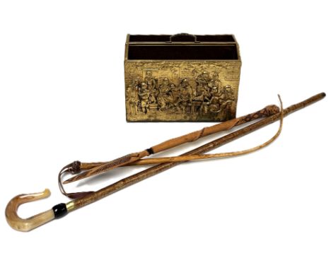 A beaten brass magazine rack, a horn handled walking stick, African carved spoon and fork, (A Lot).