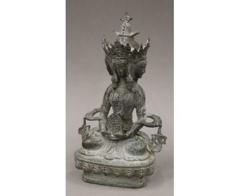 A small four face model of Buddha
