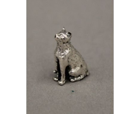 A silver model of a cat