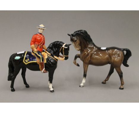A Beswick model of a Mountie on horseback and a Beswick brown stallion 