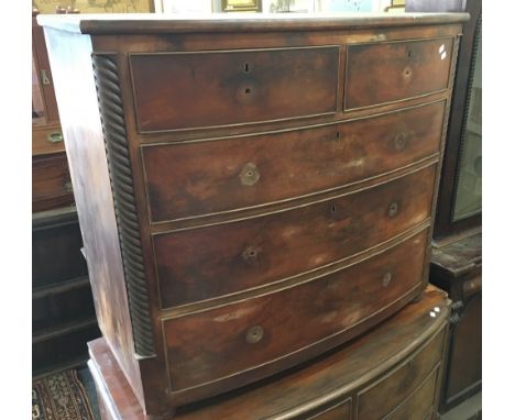 A 19th century mahogany bow front chest of two short over three long drawers 109 cm wide x 98 cm high x 54 cm deep