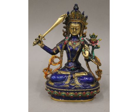 A colourfully decorated model of Buddha