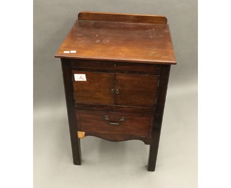 A 19th century mahogany bedside commode cupboard, 54 cm wide