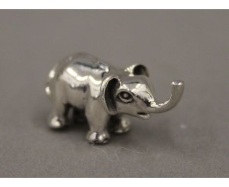 A miniature silver model of an elephant