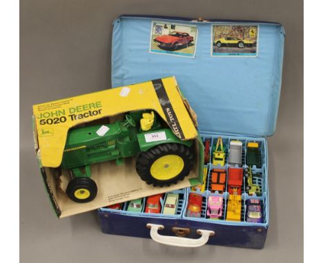 An ERTL Toys model John Deere 5020 Tractor, 1/16 scale blueprint replica, together with a quantity of Matchbox Series model c