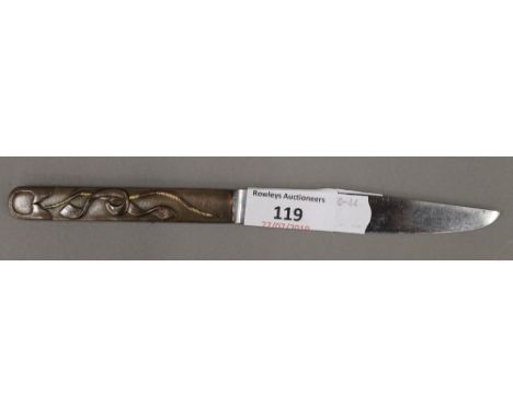 A 19th century Japanese knife with signed steel blade, the copper and gold grip decorated with an archers bow and a scroll