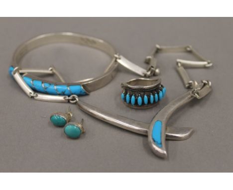 A small quantity of turquoise set Mexican silver jewellery, some marked 925, some marked 950, comprising: necklace, bangle, e