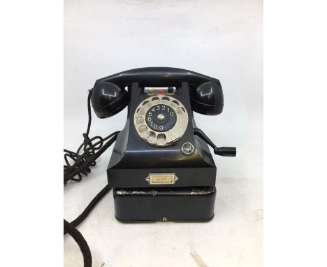 A vintage black telephone with stand (TELEGRAFVERKETS, VERKSTAD, NYNASHAMY), (BG 461/1, Schema, SI. ganga, TV1 1952)