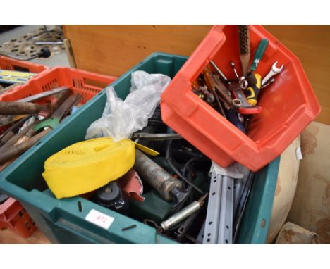 A large plastic container of power tools etc
