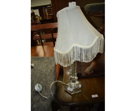 A modern glass table lamp