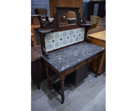A Victorian washstand having mirror and tile back and marble top on turned frame, width approx. 108cm