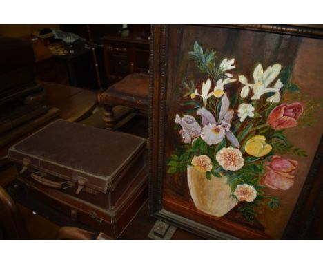A fire screen and two vintage suitcases