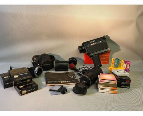 A lot of various cameras and equipment to include an Olympus OM2 35mm camera, a GAF XL2 super 8 cine camera & various lenses,