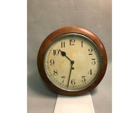 British made barrel wall clock. 4 day running. comes with pendulum & keys. measures 39cm in diameter 