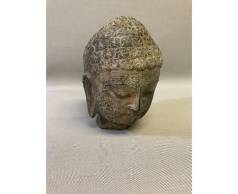 Antique hard stone Chinese Buddha head. Has Chinese seal of some sort to the back of the neck. Measures 21cm in height. 