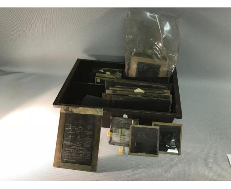 A container of various Old naval engine slides 