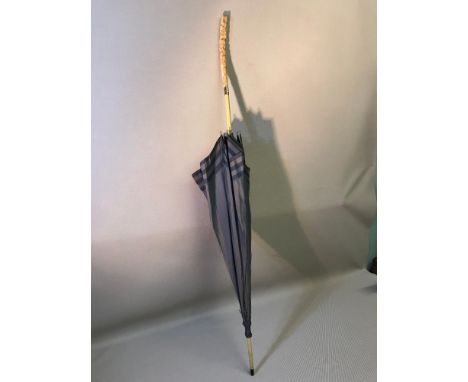 A Victorian vintage umbrella with carved bone handle depicting rodents 