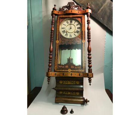 Edwardian inlaid American wall clock , comes with key and pendulum. Measures 100cm in height. 