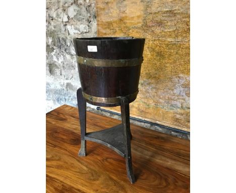 Vintage barrel plant stand with brass liners and pedestal legs, 68cm  in height 