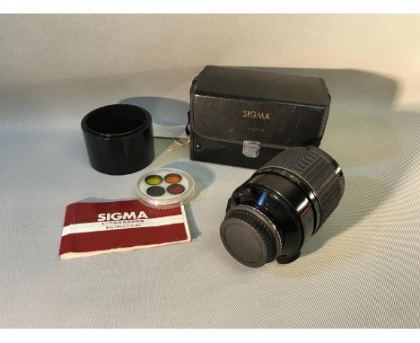 A Sigma 600mm F/8 lens complete with accessories, manual & original carry bag 