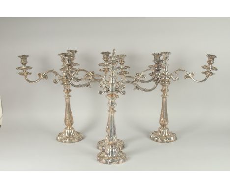 A SUPERB SET OF FOUR OLD SHEFFIELD PLATE, TWO BRANCH CHANDELIERS adapted to stack to a five light candelabra and a pair of si