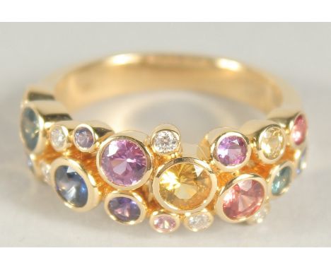 A SUPERB 18CT YELLOW GOLD MULTICOLOURED STONE RING in a box. Size N.